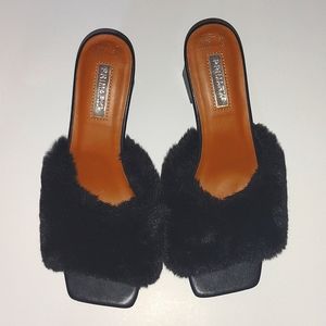 black mules in black faux fur by primemark